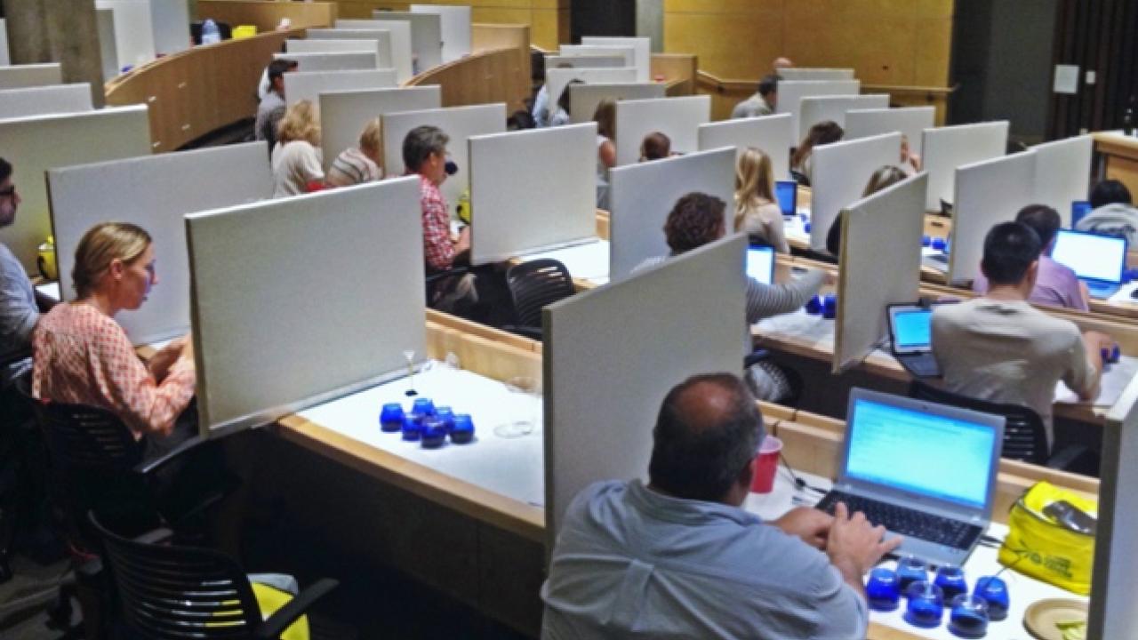 Olive oil testers in cubicles